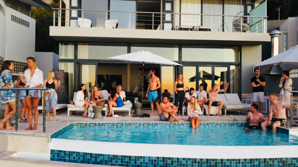 Image of digital nomads at the pool at the digital nomad retreat in Cape Town by Work Wanderers for Digital Nomads Daily